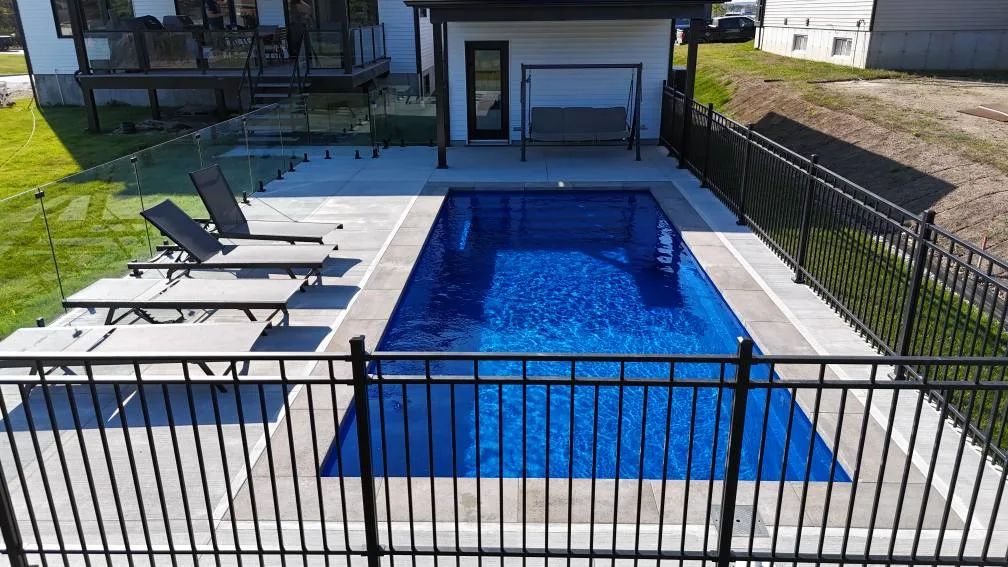 Mova fiberglass inground pool, model 12x28, Diamond finish in Fond Marin, installed by PurPiscine