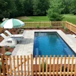 Mova fiberglass inground pool, model 12x28, Diamond finish in Fond Rocheux, installed by CV — side view