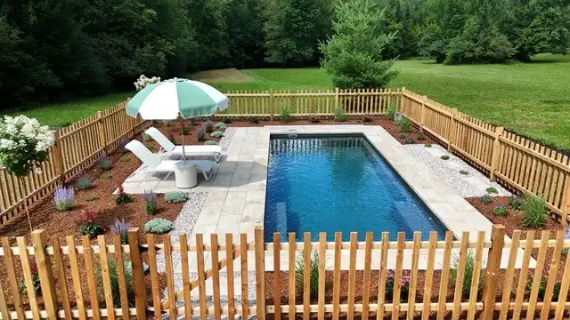Mova fiberglass inground pool, model 12x28, Diamond finish in Fond Rocheux, installed by CV — side view