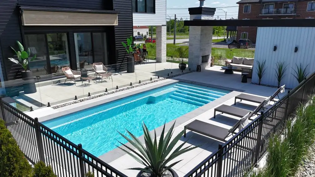 Mova fiberglass inground pool, model 12x28, Diamond finish in Loup Gris, installed by PurPiscine