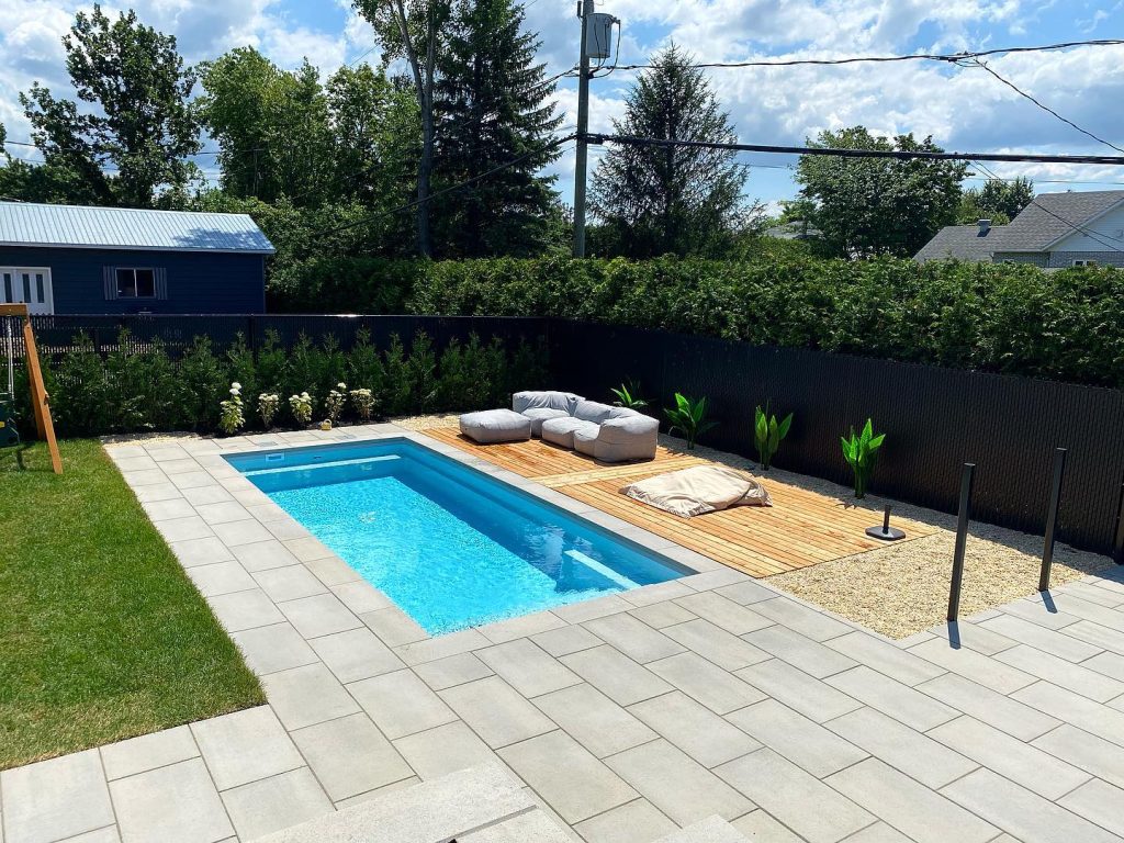 Mova fiberglass inground pool, model 11x19, Diamond finish in Loup Gris, installed by FondaStructure