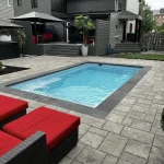 Piscine creusée en fibre de verre Mova, modèle 12x20, finition Diamant couleur Loup Gris, chez Pave FJB
