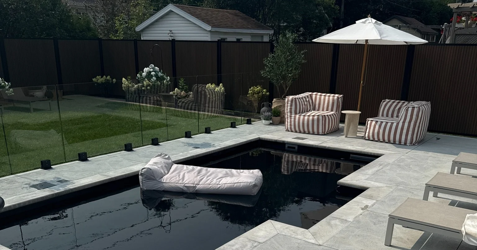 Mova fiberglass inground pool, model 12x22, Diamond finish in Noir Profond, installed by Concept Piscine Design