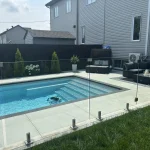 Mova fiberglass inground pool, model 12x24, Diamond finish in Loup gris, installed by VitA Piscine