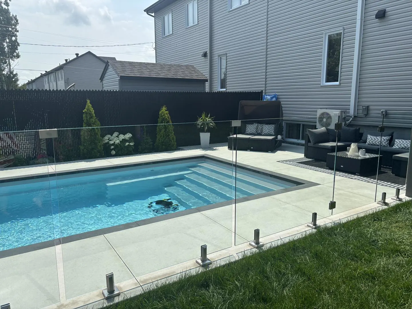 Mova fiberglass inground pool, model 12x24, Diamond finish in Loup gris, installed by VitA Piscine